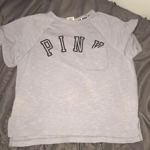 PINK light blue shirt.